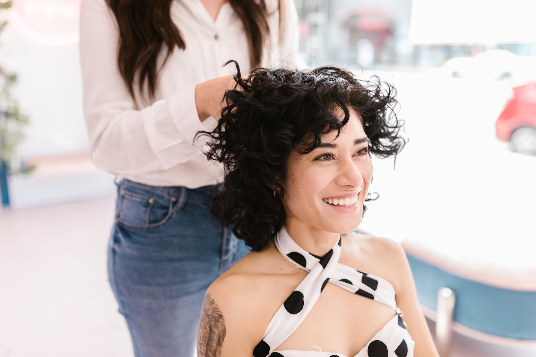 a woman getting her hair done in the salon